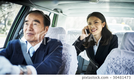 Taxi business woman smartphone business talks 30481473
