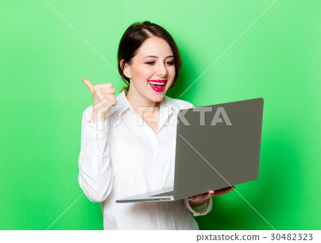 young woman with laptop young woman with laptop 30482323