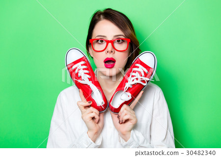 young woman with gumshoes young woman with gumshoes 30482340