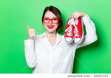 young woman with gumshoes young woman with gumshoes 30482343