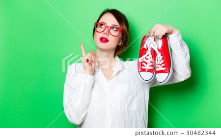young woman with gumshoes young woman with gumshoes 30482344