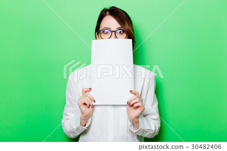 young surprised woman with paper 30482406