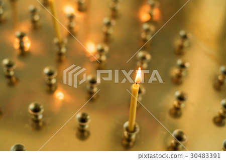 Church candles on the background bokeh 30483391