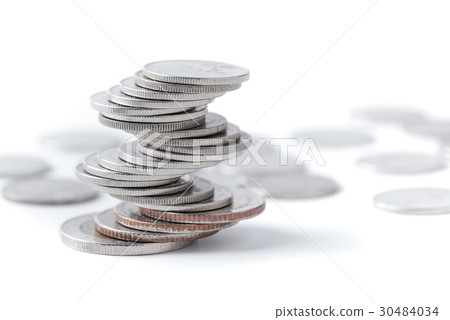 Coins stacked on each other in different position. 30484034
