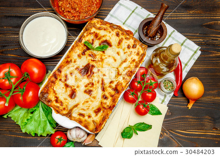 Classic Lasagna with bolognese and bechamel sauce Classic Lasagna with bolognese and bechamel sauce 30484203