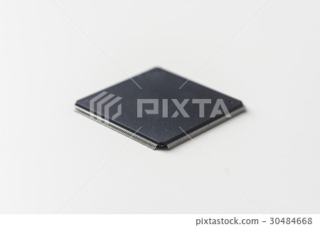 semiconductor IC chip isolated on grey background semiconductor IC chip isolated on grey background 30484668