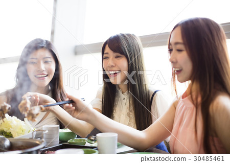 happy young Women group  Eating hot pot 30485461