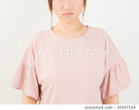 A woman with a sad expression A woman with a sad expression 30487584