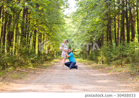 Happy beautiful pregnant woman and her husband Happy beautiful pregnant woman and her husband 30488033