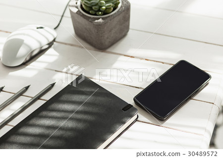 Office desk table with computer, supplies and 30489572