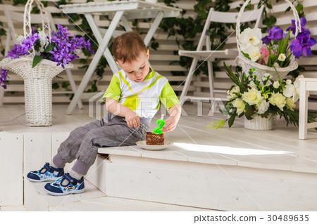 Happy little kid boy celebrating his birthday 30489635
