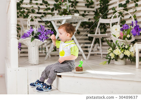 Happy little kid boy celebrating his birthday Happy little kid boy celebrating his birthday 30489637