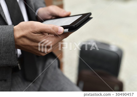 young businessman using a tablet 30490457