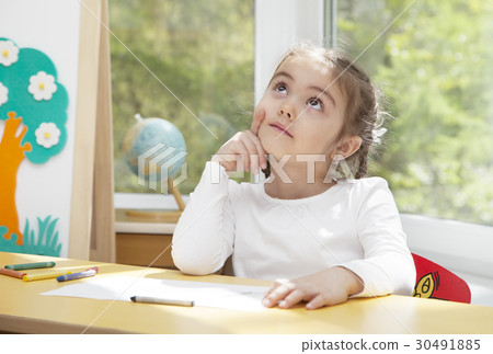 Little girl in thoughts 30491885