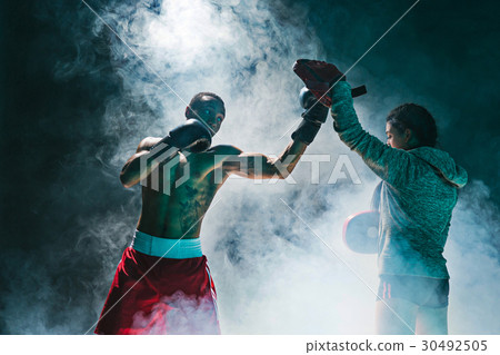 Handsome Afro American boxer with bare torso is Handsome Afro American boxer with bare torso is 30492505