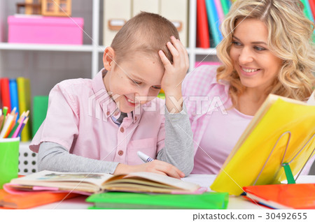 Mom and son  doing lessons  30492655