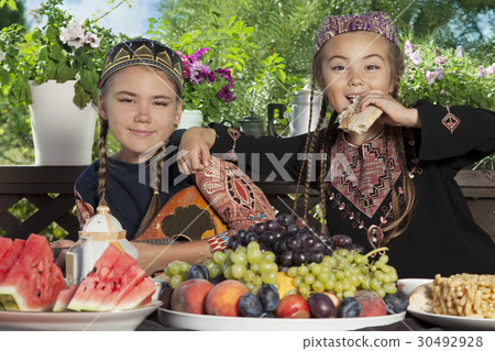 Two little Asian girls have breakfast Two little Asian girls have breakfast 30492928