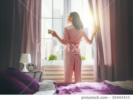 woman enjoying sunny morning woman enjoying sunny morning 30493433