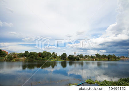 peaceful riverside city landscape in country side 30494162