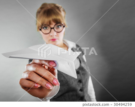 Fly fear. Woman holding airplane in hand. Fly fear. Woman holding airplane in hand. 30494259