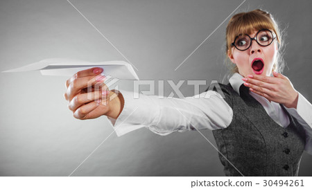 Fly fear. Woman holding airplane in hand. Fly fear. Woman holding airplane in hand. 30494261