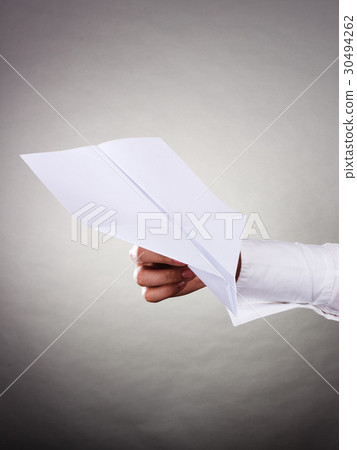 Fly fear. Woman holding airplane in hand. Fly fear. Woman holding airplane in hand. 30494262