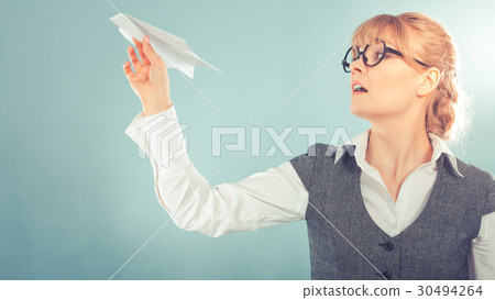 Fly fear. Woman holding airplane in hand. Fly fear. Woman holding airplane in hand. 30494264