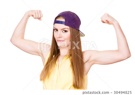 Woman casual style showing off muscles biceps Woman casual style showing off muscles biceps 30494825
