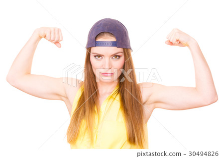 Woman casual style showing off muscles biceps Woman casual style showing off muscles biceps 30494826