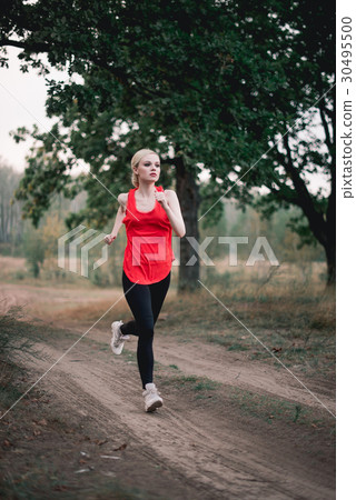 Young girl doing yoga fitness exercise outdoor Young girl doing yoga fitness exercise outdoor 30495500