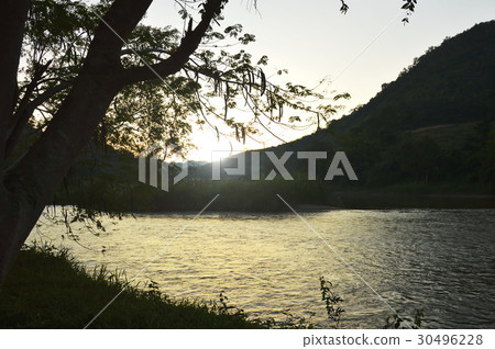 silhouette mountain and river before sunset 30496228