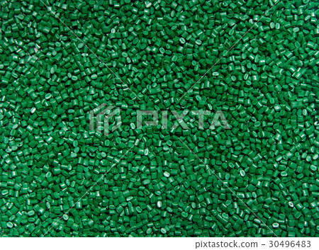 The plastic granules  green for the background . 30496483