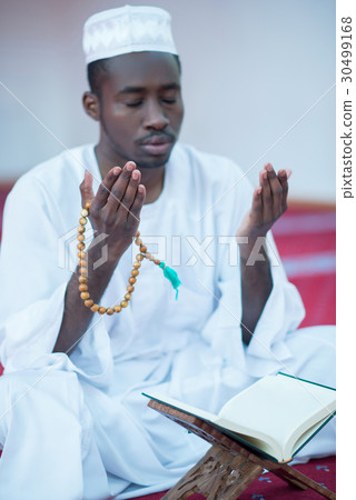 African Muslim Man Praying To God 30499168