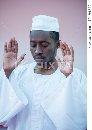 African Muslim Man Praying To God 30499242