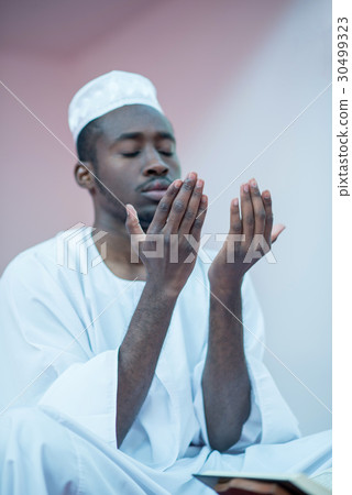 African Muslim Man Praying To God 30499323