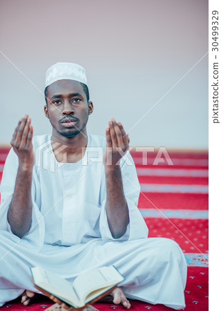 African Muslim Man Praying To God 30499329