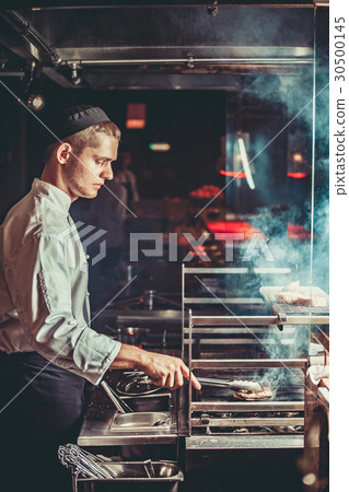 Preparing traditional beef steak 30500145