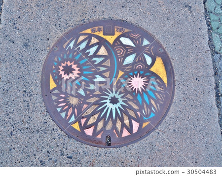 A manhole cover of Matsumoto city, Nagano, Japan. A manhole cover of Matsumoto city, Nagano, Japan. 30504483
