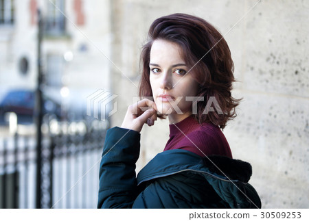 Beautiful young girl with dark hair Beautiful young girl with dark hair 30509253