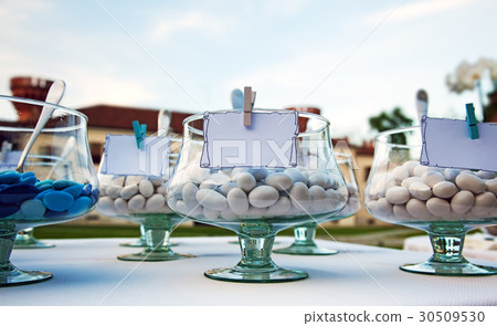 Glasses with candies and blank labels 30509530