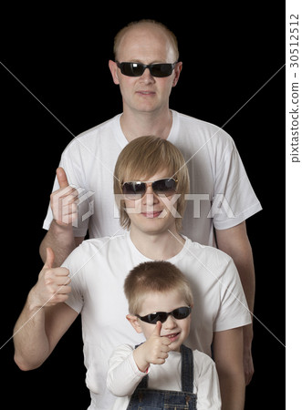 Father and sons giving thumbs up sign Father and sons giving thumbs up sign 30512512