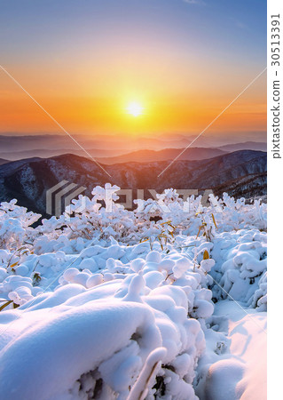 Sunrise on Deogyusan mountains covered with snow. Sunrise on Deogyusan mountains covered with snow. 30513391