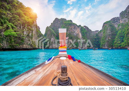 Long boat and blue water at Maya bay. Long boat and blue water at Maya bay. 30513410