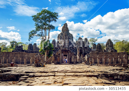 Bayon Temple with giant stone faces, Angkor Wat. 30513435