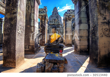 Ancient stone faces of Bayon temple, Angkor Wat. Ancient stone faces of Bayon temple, Angkor Wat. 30513440