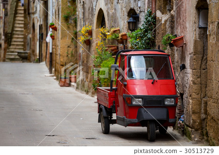 Piaggio Ape at the empty street Piaggio Ape at the empty street 30513729