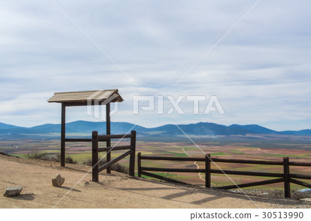A view from observation desk with fence to fields 30513990