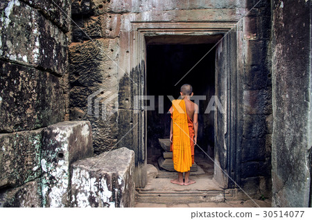 The monks in the ancient stone faces. 30514077