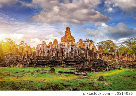 Ancient stone faces of Bayon temple, Angkor Wat. Ancient stone faces of Bayon temple, Angkor Wat. 30514086