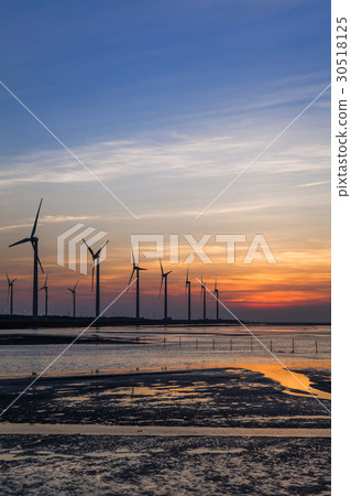 sunset in the windmills and coast in Taiwan. sunset in the windmills and coast in Taiwan. 30518125